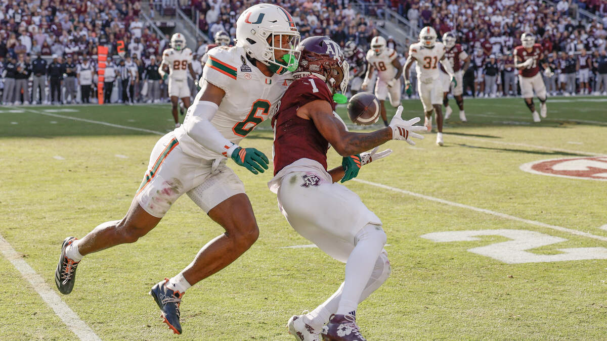 Miami Hurricanes cornerback Xavier Lucas (6) hits Texas A&M Aggies wide receiver Mario Craver (1) for an incomplete pass late in the fourth quarter during the first round of the 2025 College Football Playoff at Kyle Field at College Station, Texas, on Saturday, December 20, 2025. Miami Hurricanes cornerback Xavier Lucas (6) hits Texas A&M Aggies wide receiver Mario Craver (1) for an incomplete pass late in the fourth quarter during the first round of the 2025 College Football Playoff at Kyle Field at College Station, Texas, on Saturday, December 20, 2025.